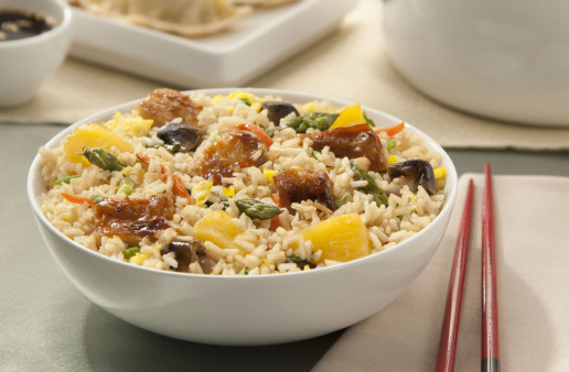 Chinese Stir Fried Rice and Pineapple in Round White Bowl with Chop Sticks