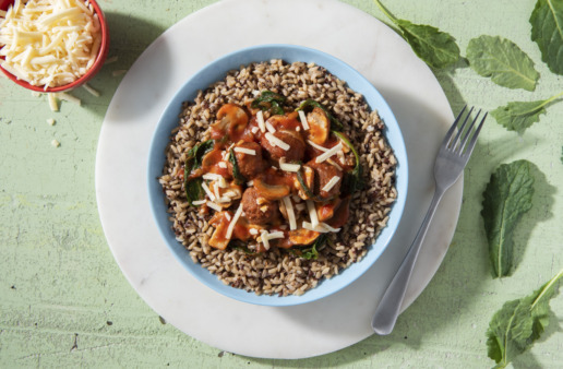 Multi-grain rice bowl with Italian meatballs, sauce and cheese